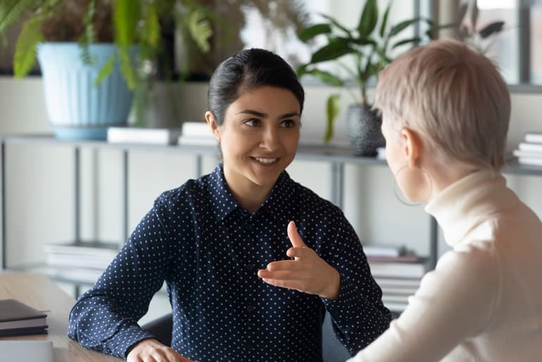 Business women in conversation