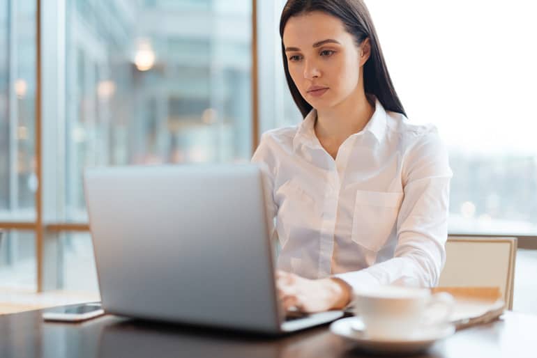 Business woman working on her computer