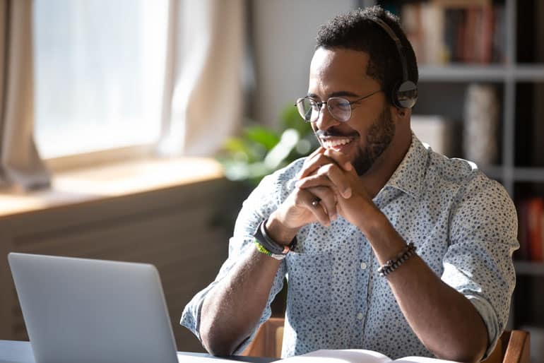 African American man attending project management webinar