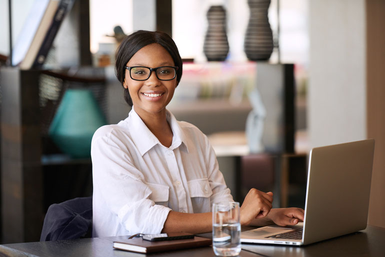 Woman working on project skills at computer